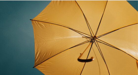 yellow umbrella representing insurance coverage